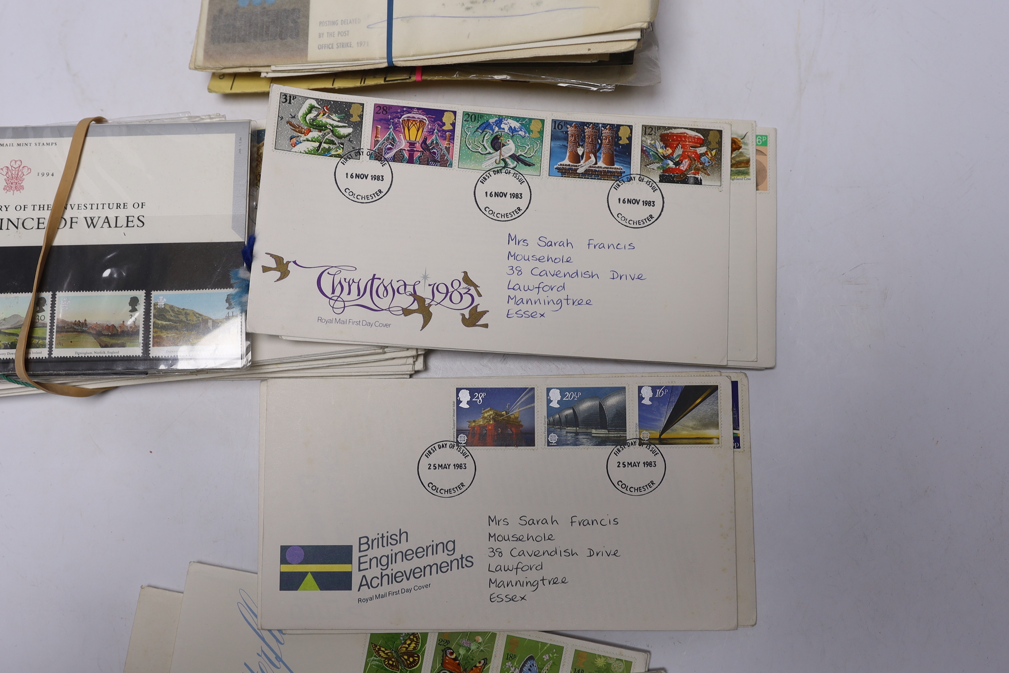 A collection of postage stamps and First Day covers